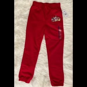 Red, Disney sweats for kids. Size large. New with tag.